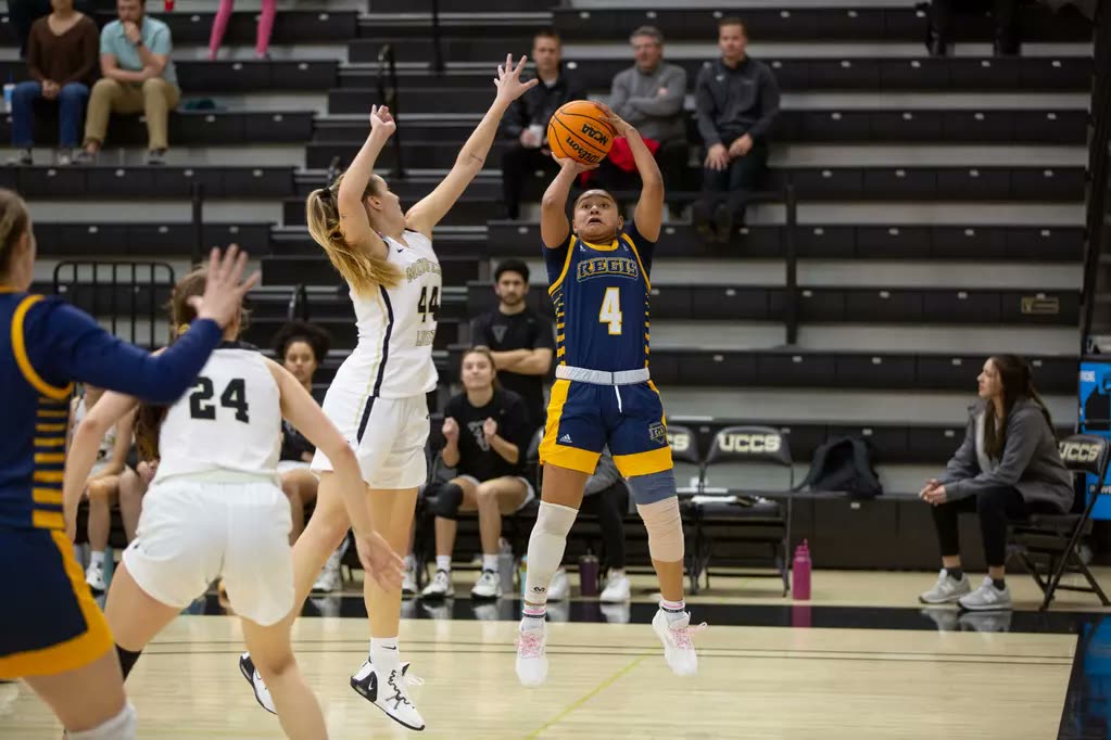Player rising up for a jump shot in a game